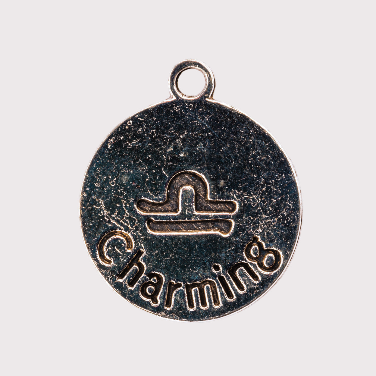 Charm - Libra (September 23-October 22)