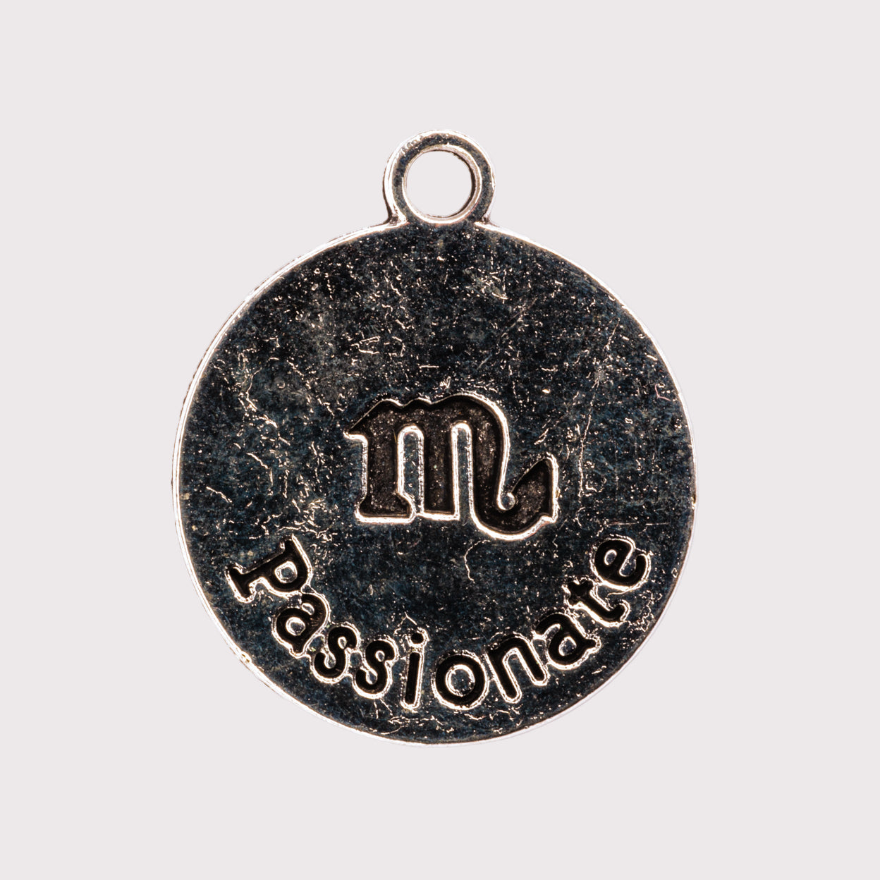 Charm - Scorpio (October 23-November 22)